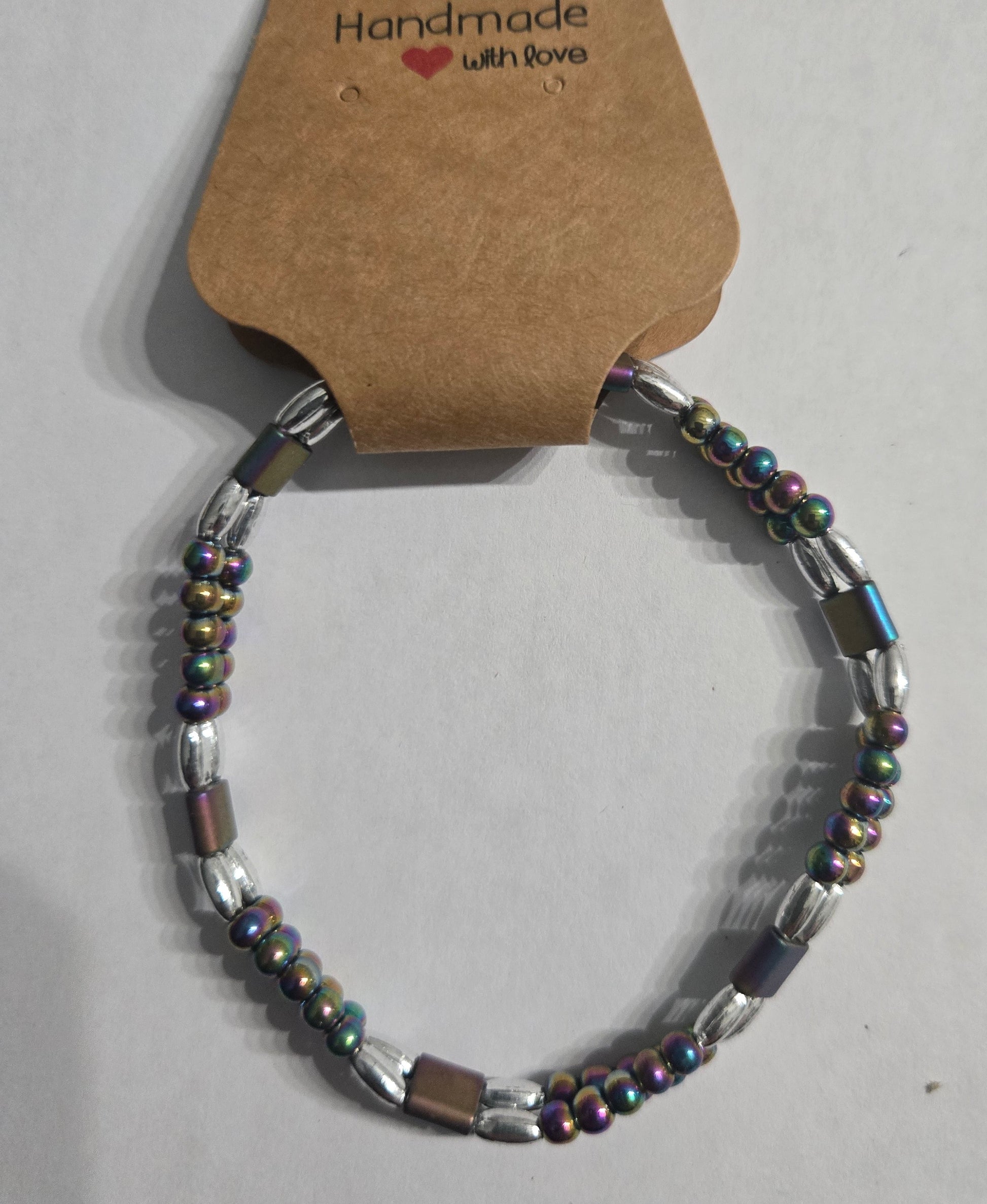 Multicolored beaded double strand bracelet with assorted metal spacer beads.