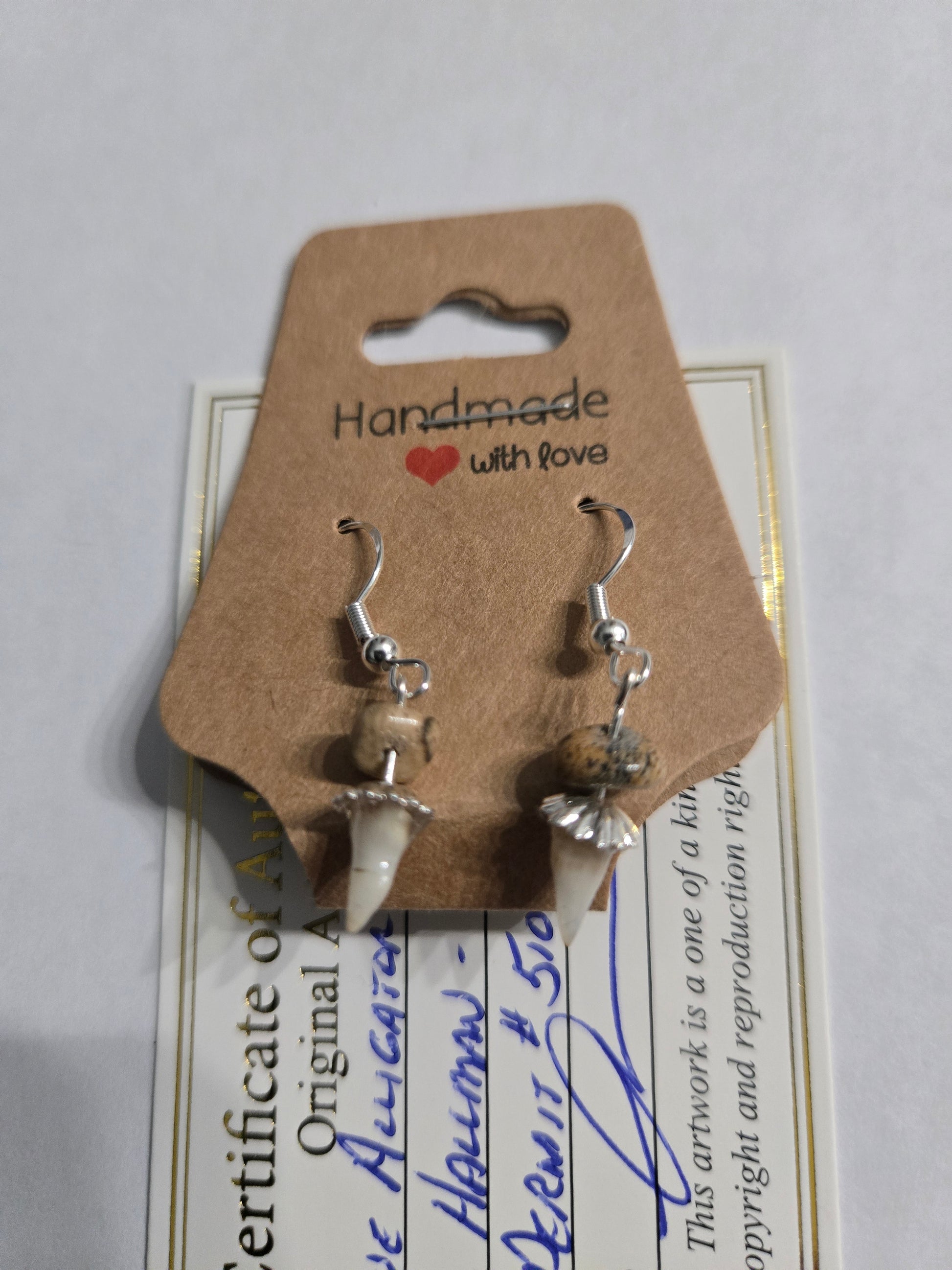 Genuine Alligator Teeth earrings with sandstone accents, on sterling silver earring facets.
