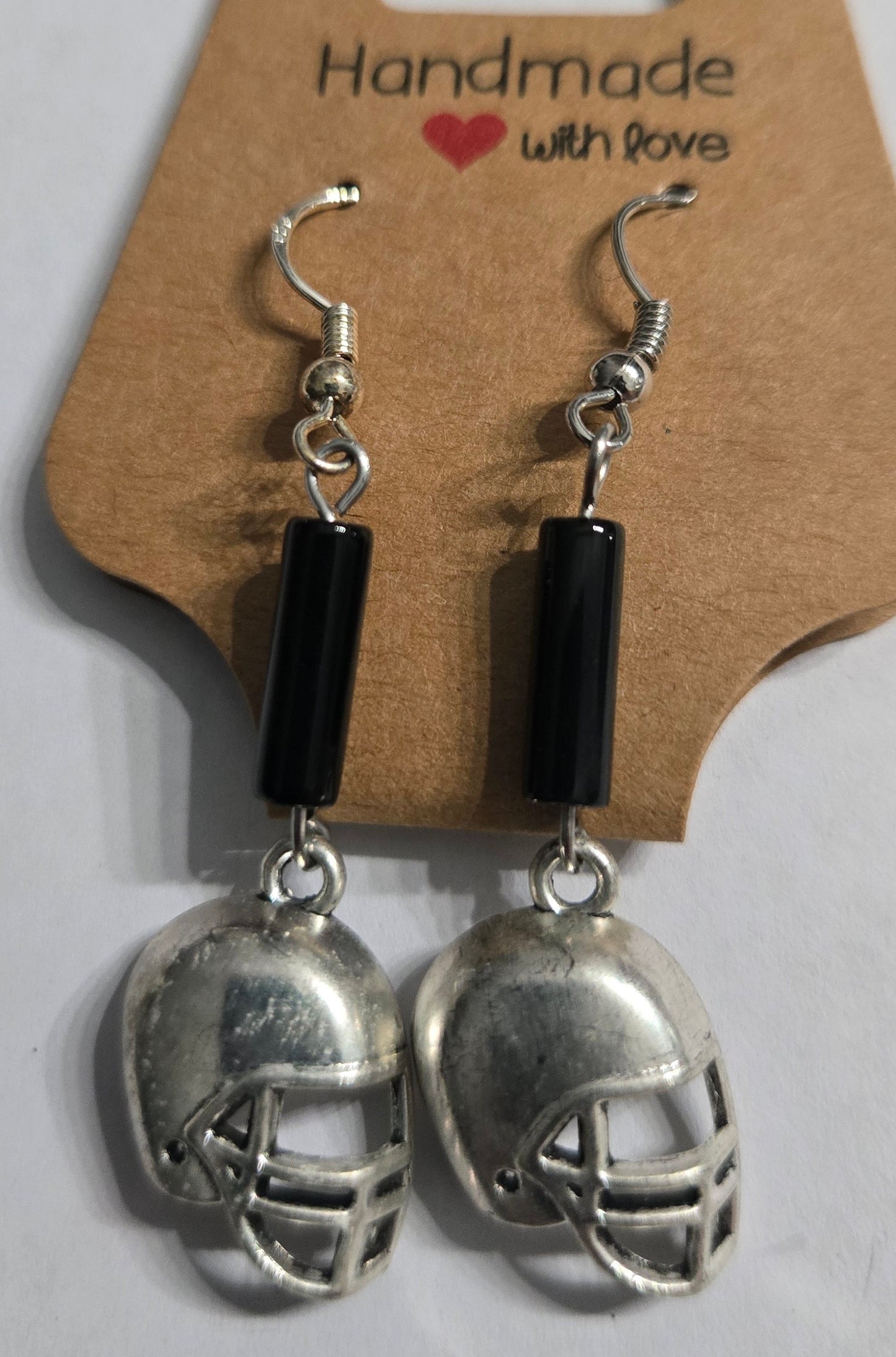 Sterling silver earrings with football charms.